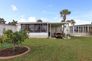 Sassy and charming 2 bedroom, 2 full bath home in award-winning on Maple Leaf Golf and Country Club in Florida - for sale on GolfHomes.com, golf home, golf lot