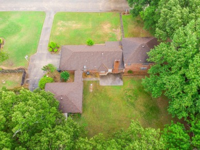 Enjoy this beautiful home with 3 bedrooms and 2 and a half baths on Rolling Hills Country Club Inc in Arkansas - for sale on GolfHomes.com, golf home, golf lot