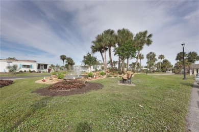 Sassy and charming 2 bedroom, 2 full bath home in award-winning on Maple Leaf Golf and Country Club in Florida - for sale on GolfHomes.com, golf home, golf lot