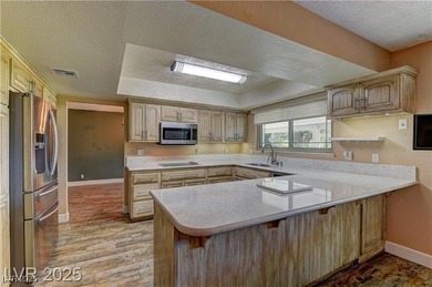 Beautifully maintained 4BR/2.75BA home situated on the 6th on Boulder City Municipal Golf Course in Nevada - for sale on GolfHomes.com, golf home, golf lot