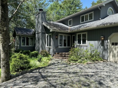 A must-see spacious home nestled in the gated Timber Trails on Lake Naomi Timber Trails Golf Club in Pennsylvania - for sale on GolfHomes.com, golf home, golf lot