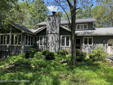 A must-see spacious home nestled in the gated Timber Trails on Lake Naomi Timber Trails Golf Club in Pennsylvania - for sale on GolfHomes.com, golf home, golf lot