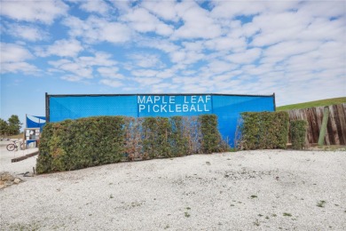 Sassy and charming 2 bedroom, 2 full bath home in award-winning on Maple Leaf Golf and Country Club in Florida - for sale on GolfHomes.com, golf home, golf lot