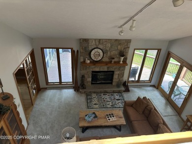 A must-see spacious home nestled in the gated Timber Trails on Lake Naomi Timber Trails Golf Club in Pennsylvania - for sale on GolfHomes.com, golf home, golf lot