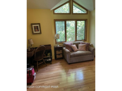 A must-see spacious home nestled in the gated Timber Trails on Lake Naomi Timber Trails Golf Club in Pennsylvania - for sale on GolfHomes.com, golf home, golf lot