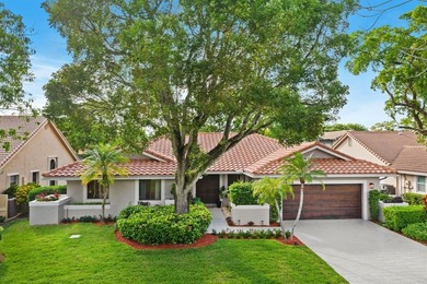 Bright & inviting 4BR/2.5BA pool home in the gated golf on TPC Eagle Trace in Florida - for sale on GolfHomes.com, golf home, golf lot