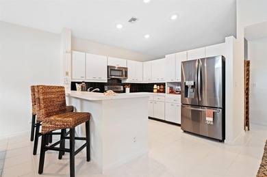 Bright & inviting 4BR/2.5BA pool home in the gated golf on TPC Eagle Trace in Florida - for sale on GolfHomes.com, golf home, golf lot