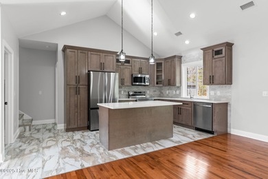 Stunning custom 3 bedroom, 3 bathroom plus a bonus room home in on Carolina Shores Golf Course in North Carolina - for sale on GolfHomes.com, golf home, golf lot