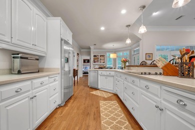 Discover the perfect blend of elegance and timeless charm in on Golden Eagle Country Club in Florida - for sale on GolfHomes.com, golf home, golf lot