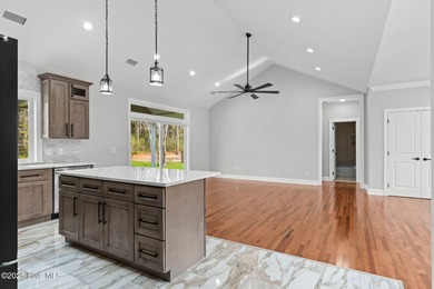 Stunning custom 3 bedroom, 3 bathroom plus a bonus room home in on Carolina Shores Golf Course in North Carolina - for sale on GolfHomes.com, golf home, golf lot