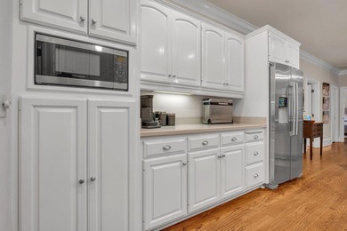 Discover the perfect blend of elegance and timeless charm in on Golden Eagle Country Club in Florida - for sale on GolfHomes.com, golf home, golf lot