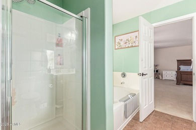 This spacious 3-bedroom, 2.5-bath home offers 2,440 sqft of on The Golf Club At Johnson Ranch in Arizona - for sale on GolfHomes.com, golf home, golf lot