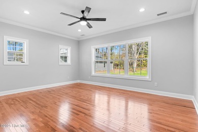 Stunning custom 3 bedroom, 3 bathroom plus a bonus room home in on Carolina Shores Golf Course in North Carolina - for sale on GolfHomes.com, golf home, golf lot