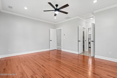 Stunning custom 3 bedroom, 3 bathroom plus a bonus room home in on Carolina Shores Golf Course in North Carolina - for sale on GolfHomes.com, golf home, golf lot