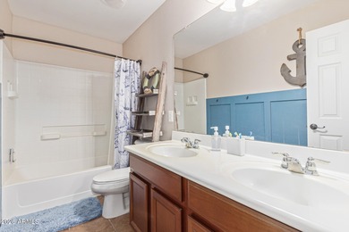 This spacious 3-bedroom, 2.5-bath home offers 2,440 sqft of on The Golf Club At Johnson Ranch in Arizona - for sale on GolfHomes.com, golf home, golf lot