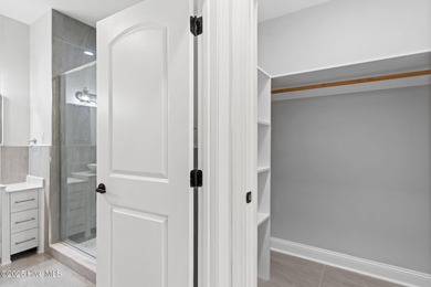 Stunning custom 3 bedroom, 3 bathroom plus a bonus room home in on Carolina Shores Golf Course in North Carolina - for sale on GolfHomes.com, golf home, golf lot