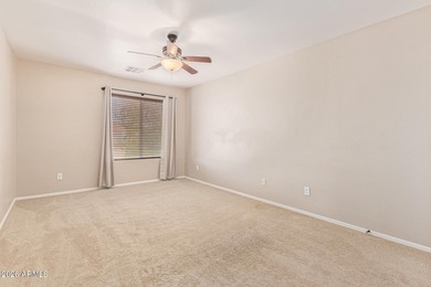 This spacious 3-bedroom, 2.5-bath home offers 2,440 sqft of on The Golf Club At Johnson Ranch in Arizona - for sale on GolfHomes.com, golf home, golf lot