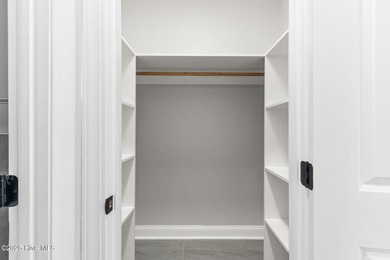 Stunning custom 3 bedroom, 3 bathroom plus a bonus room home in on Carolina Shores Golf Course in North Carolina - for sale on GolfHomes.com, golf home, golf lot