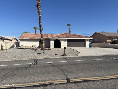Close to the golf course. This charming home with plenty of on London Bridge Golf Course in Arizona - for sale on GolfHomes.com, golf home, golf lot