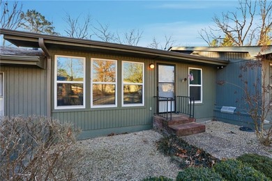 Experience the perfect blend of comfort and convenience in the on Bella Vista Country Club and Golf Course in Arkansas - for sale on GolfHomes.com, golf home, golf lot