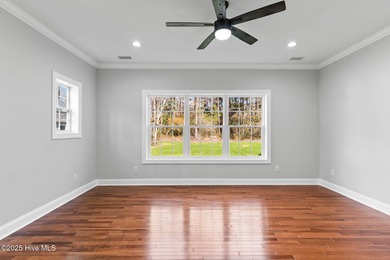 Stunning custom 3 bedroom, 3 bathroom plus a bonus room home in on Carolina Shores Golf Course in North Carolina - for sale on GolfHomes.com, golf home, golf lot