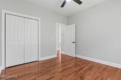 Stunning custom 3 bedroom, 3 bathroom plus a bonus room home in on Carolina Shores Golf Course in North Carolina - for sale on GolfHomes.com, golf home, golf lot