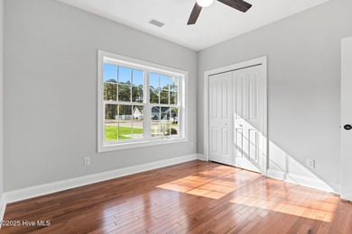 Stunning custom 3 bedroom, 3 bathroom plus a bonus room home in on Carolina Shores Golf Course in North Carolina - for sale on GolfHomes.com, golf home, golf lot