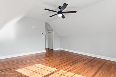 Stunning custom 3 bedroom, 3 bathroom plus a bonus room home in on Carolina Shores Golf Course in North Carolina - for sale on GolfHomes.com, golf home, golf lot