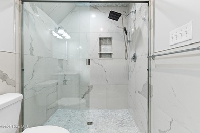 Stunning custom 3 bedroom, 3 bathroom plus a bonus room home in on Carolina Shores Golf Course in North Carolina - for sale on GolfHomes.com, golf home, golf lot