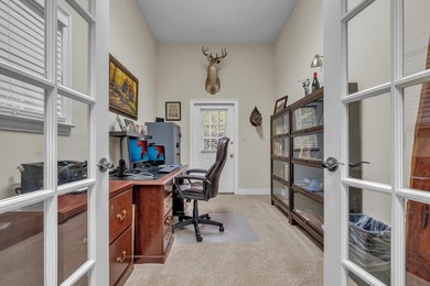 Discover the perfect blend of elegance and timeless charm in on Golden Eagle Country Club in Florida - for sale on GolfHomes.com, golf home, golf lot