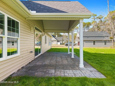 Stunning custom 3 bedroom, 3 bathroom plus a bonus room home in on Carolina Shores Golf Course in North Carolina - for sale on GolfHomes.com, golf home, golf lot
