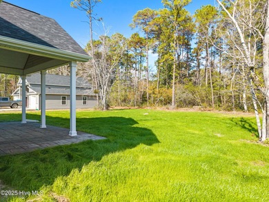 Stunning custom 3 bedroom, 3 bathroom plus a bonus room home in on Carolina Shores Golf Course in North Carolina - for sale on GolfHomes.com, golf home, golf lot