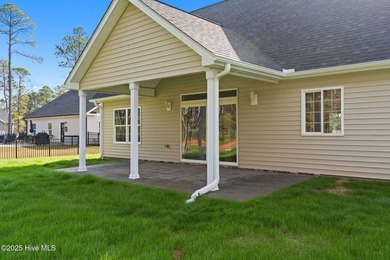 Stunning custom 3 bedroom, 3 bathroom plus a bonus room home in on Carolina Shores Golf Course in North Carolina - for sale on GolfHomes.com, golf home, golf lot