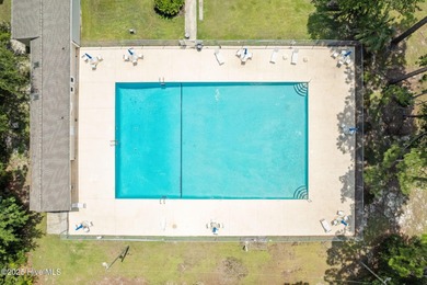 Stunning custom 3 bedroom, 3 bathroom plus a bonus room home in on Carolina Shores Golf Course in North Carolina - for sale on GolfHomes.com, golf home, golf lot