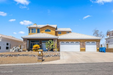 Stunning lakeview pool home located in the Residential Estates on London Bridge Golf Course in Arizona - for sale on GolfHomes.com, golf home, golf lot