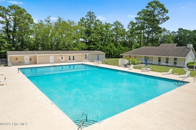 Stunning custom 3 bedroom, 3 bathroom plus a bonus room home in on Carolina Shores Golf Course in North Carolina - for sale on GolfHomes.com, golf home, golf lot