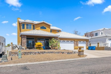 Stunning lakeview pool home located in the Residential Estates on London Bridge Golf Course in Arizona - for sale on GolfHomes.com, golf home, golf lot