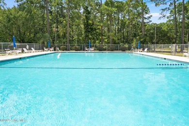 Stunning custom 3 bedroom, 3 bathroom plus a bonus room home in on Carolina Shores Golf Course in North Carolina - for sale on GolfHomes.com, golf home, golf lot