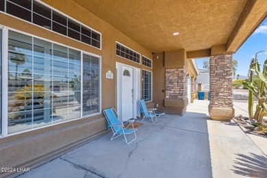 Stunning lakeview pool home located in the Residential Estates on London Bridge Golf Course in Arizona - for sale on GolfHomes.com, golf home, golf lot