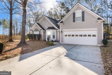 Welcome to this meticulously maintained ranch-style home in the on Canongate At Heron Bay in Georgia - for sale on GolfHomes.com, golf home, golf lot