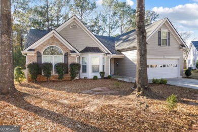 Welcome to this meticulously maintained ranch-style home in the on Canongate At Heron Bay in Georgia - for sale on GolfHomes.com, golf home, golf lot