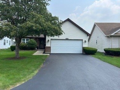 This Cartier single level model is located in Carillon an active on The Links at Carillon in Illinois - for sale on GolfHomes.com, golf home, golf lot