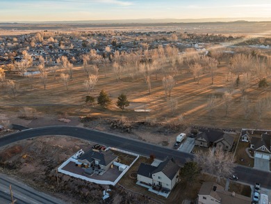 Imagine coming home to wide-open skies, mountain views, and the on Roosevelt Municipal Golf Course in Utah - for sale on GolfHomes.com, golf home, golf lot