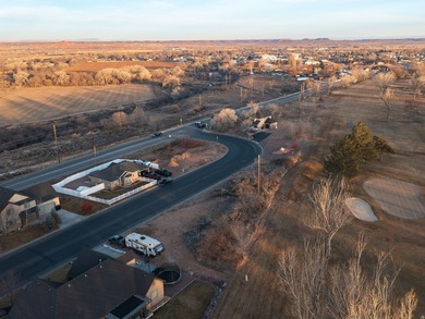 Imagine coming home to wide-open skies, mountain views, and the on Roosevelt Municipal Golf Course in Utah - for sale on GolfHomes.com, golf home, golf lot