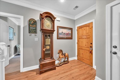 Enjoy true lock and go living in this beautiful gated, lakefront on The Patriot Golf Club At Grand Harbor in South Carolina - for sale on GolfHomes.com, golf home, golf lot