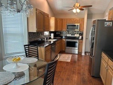 This Cartier single level model is located in Carillon an active on The Links at Carillon in Illinois - for sale on GolfHomes.com, golf home, golf lot