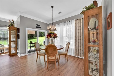 Enjoy true lock and go living in this beautiful gated, lakefront on The Patriot Golf Club At Grand Harbor in South Carolina - for sale on GolfHomes.com, golf home, golf lot