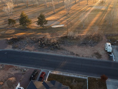 Imagine coming home to wide-open skies, mountain views, and the on Roosevelt Municipal Golf Course in Utah - for sale on GolfHomes.com, golf home, golf lot