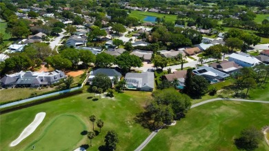 * * NEW DIMENSIONAL SHINGLE ROOF AND FLAT ROOF BEING INSTALLED * on Countryside Country Club in Florida - for sale on GolfHomes.com, golf home, golf lot