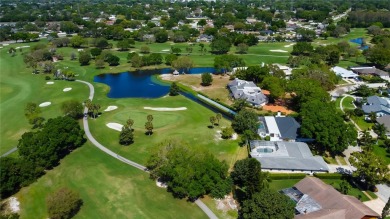 * * NEW DIMENSIONAL SHINGLE ROOF AND FLAT ROOF BEING INSTALLED * on Countryside Country Club in Florida - for sale on GolfHomes.com, golf home, golf lot